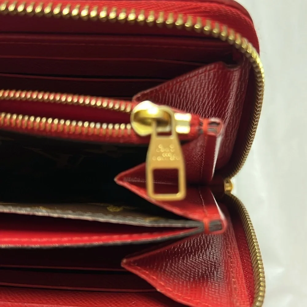 Louis Vuitton Monogram Retiro Cerese Zippy wallet. Comes with COA